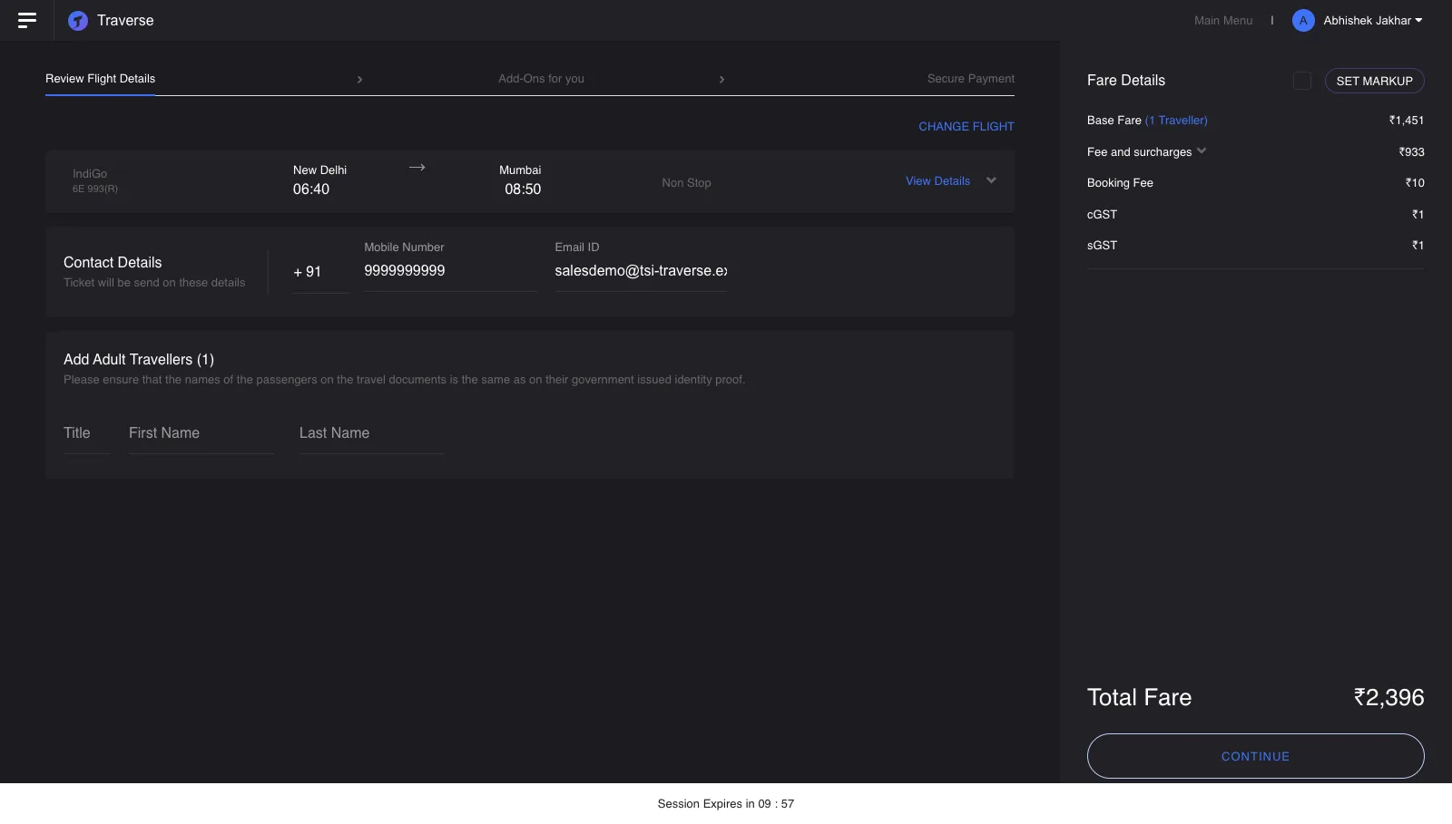 The review screen showing flight details, a contact form and a fare breakdown totalling ₹2,396